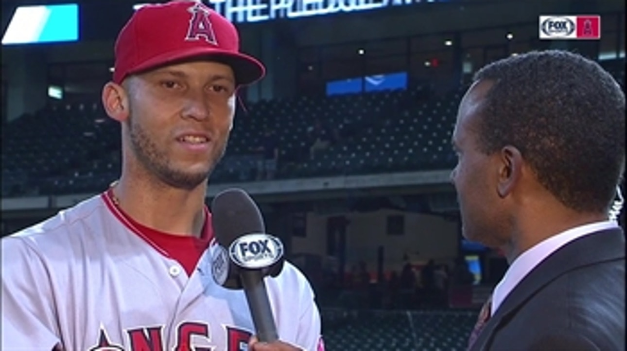 Andrelton Simmons all smiles while discussing David Fletcher