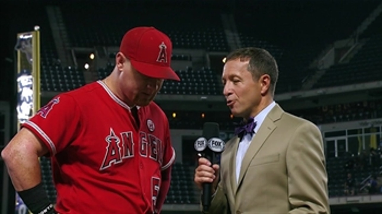 Ken Rosenthal speaks with Kole Calhoun after the Angels' extra-inning win over the Rangers