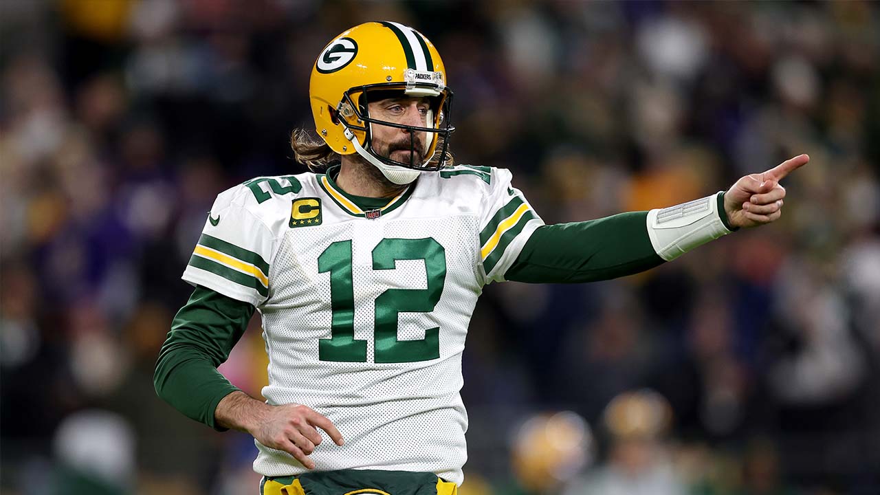 Aaron Rodgers continues his MVP campaign, throwing for three TDs to equal Brett Favre's TD record as a Packer against Ravens