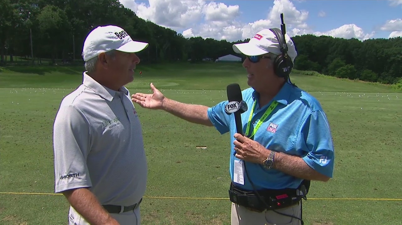 Fred Couples speaks with Curtis Strange ahead of his start at the Senior U.S. Open