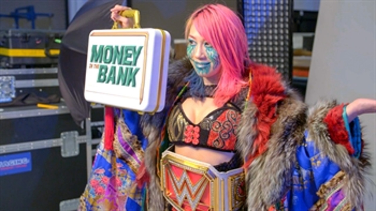 Asuka poses with the Raw Women’s Championship: WWE.com Exclusive, May 11, 2020