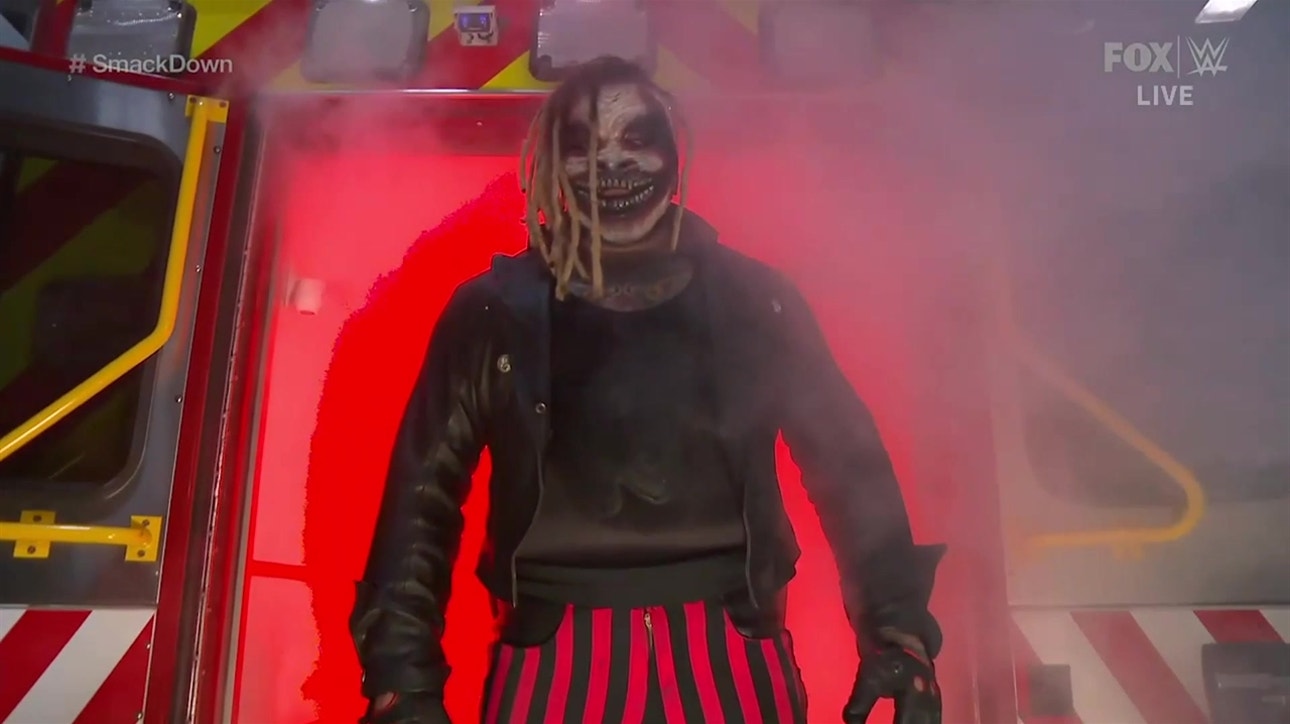 Braun Strowman attacks Bray Wyatt in the Firefly Funhouse