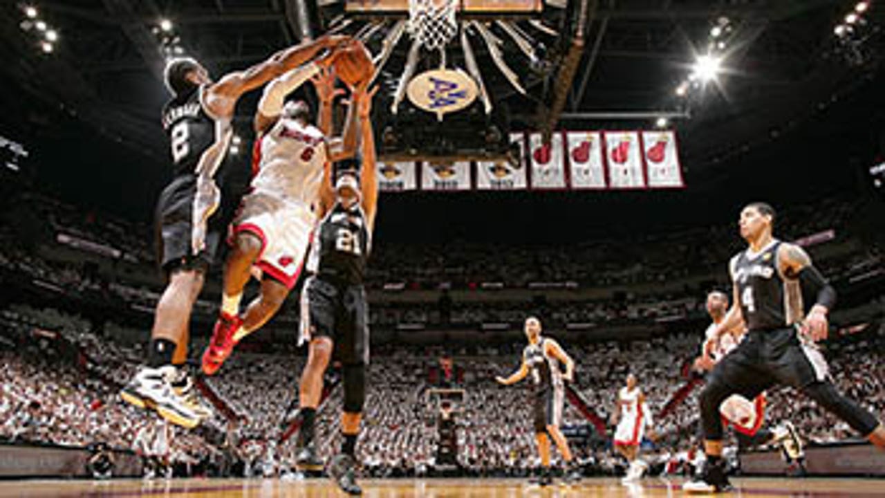 Leonard leads Spurs to win in Miami