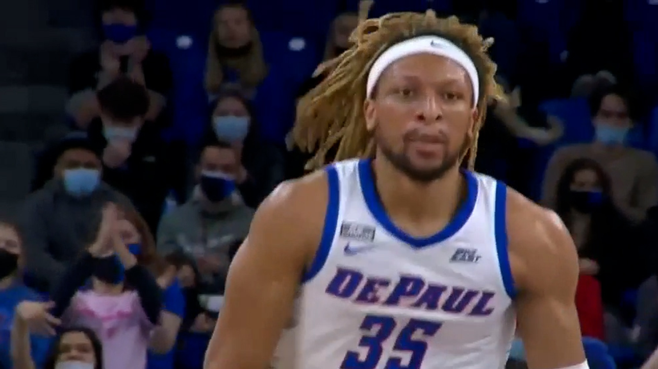 Brandon Johnson gets through traffic for slam to help DePaul extend lead over Central Michigan, 18-9