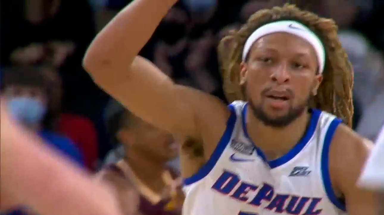 Brandon Johnson gets through defense for the dunk to put DePaul ahead of Central Michigan, 30-28