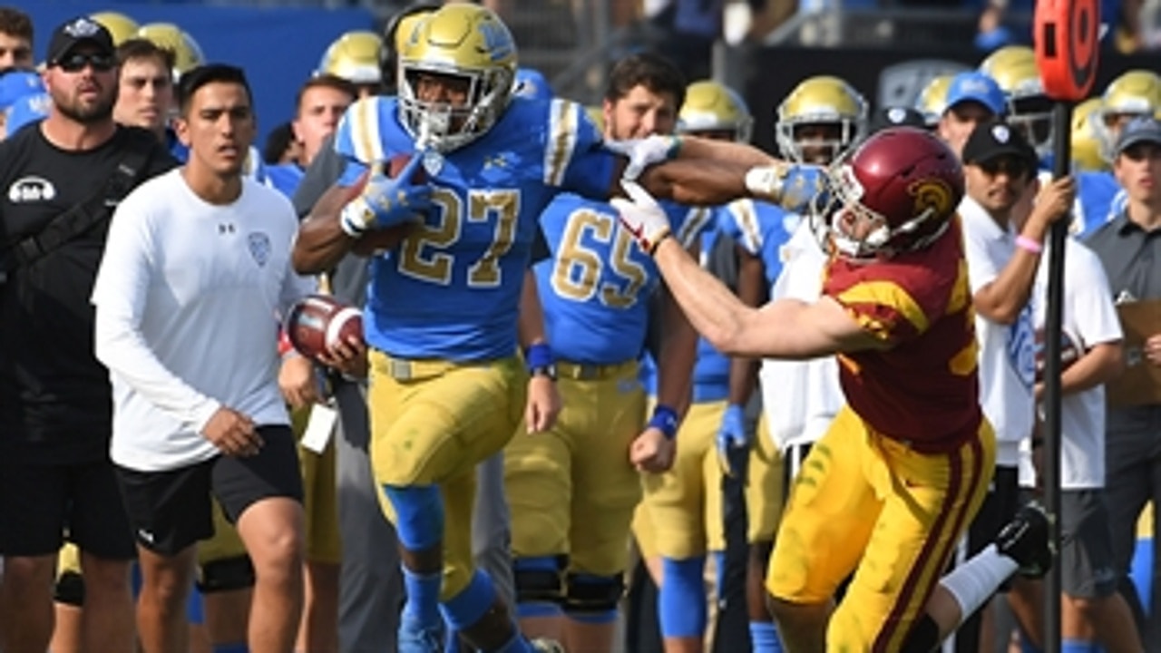 Joshua Kelley's 289 rushing yards help UCLA stun USC 34-27 to claim the Victory Bell