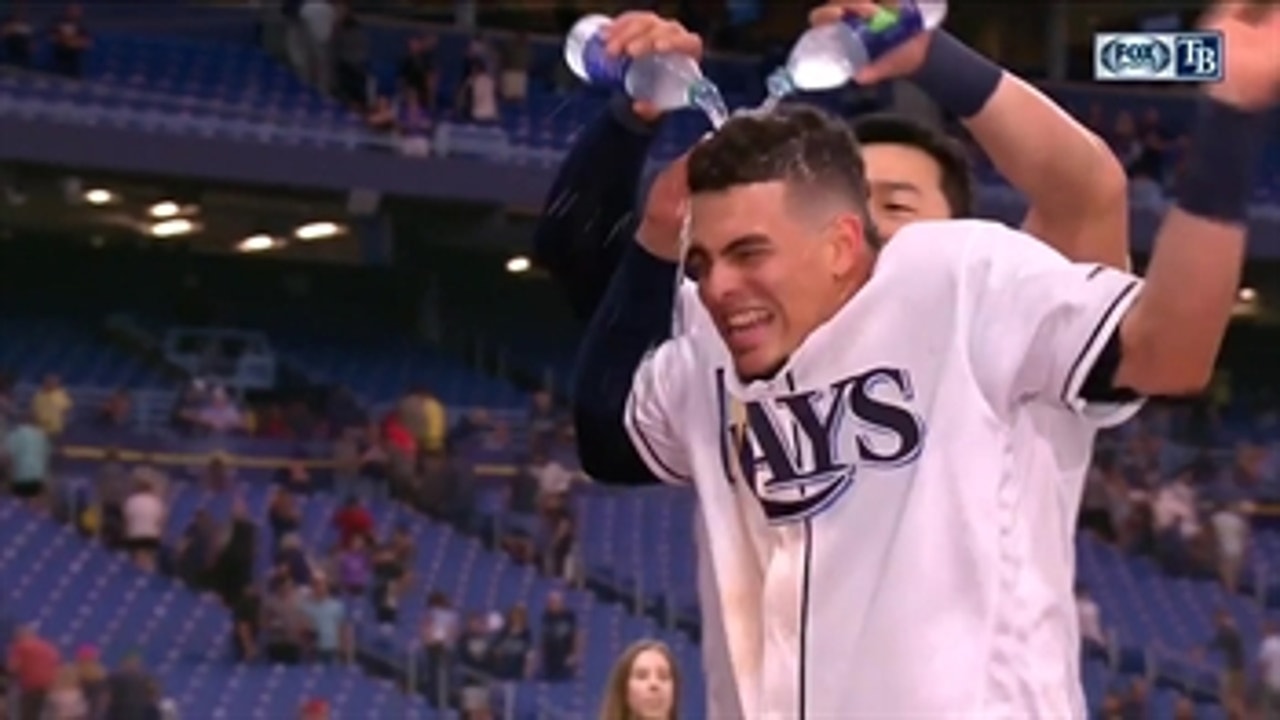 Willy Adames gets drenched after his game winning RBI