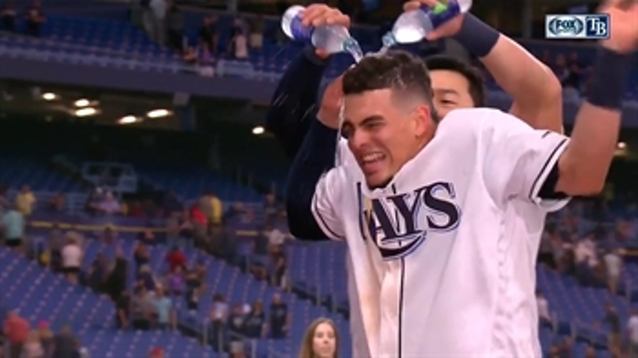 Willy Adames gets drenched after his game-winning RBI