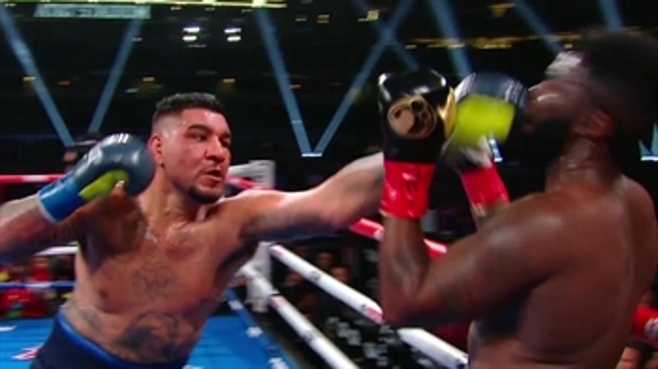 Chris Arreola rocks Jean Pierre Augustin to secure 3rd-round win