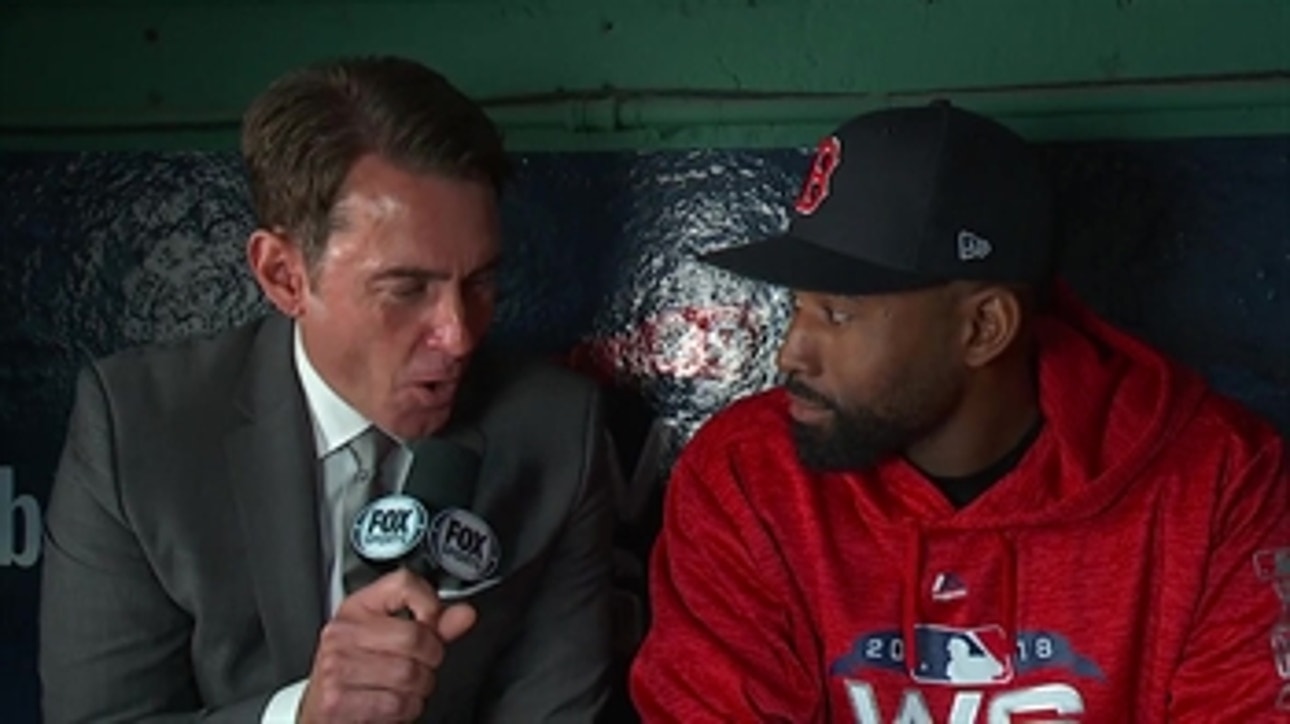 Jackie Bradley Jr. talks to Tom Verducci before Game 2 of the 2018 World Series