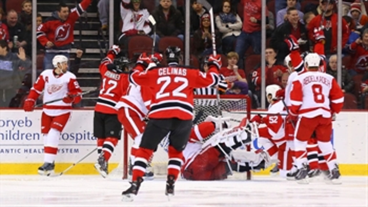 Devils down Red Wings late