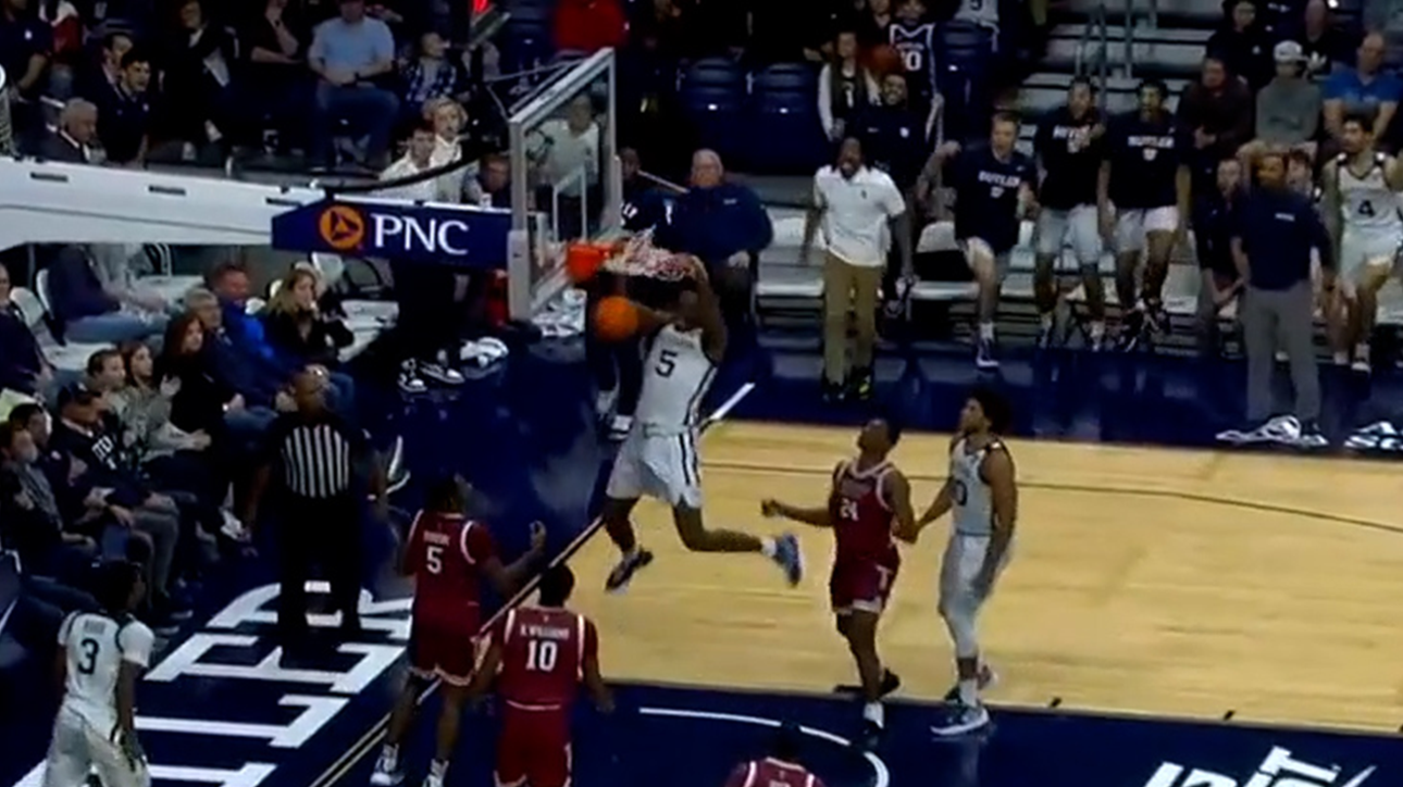 Butlers' Myles Wilmoth puts down a two-handed slam against Troy