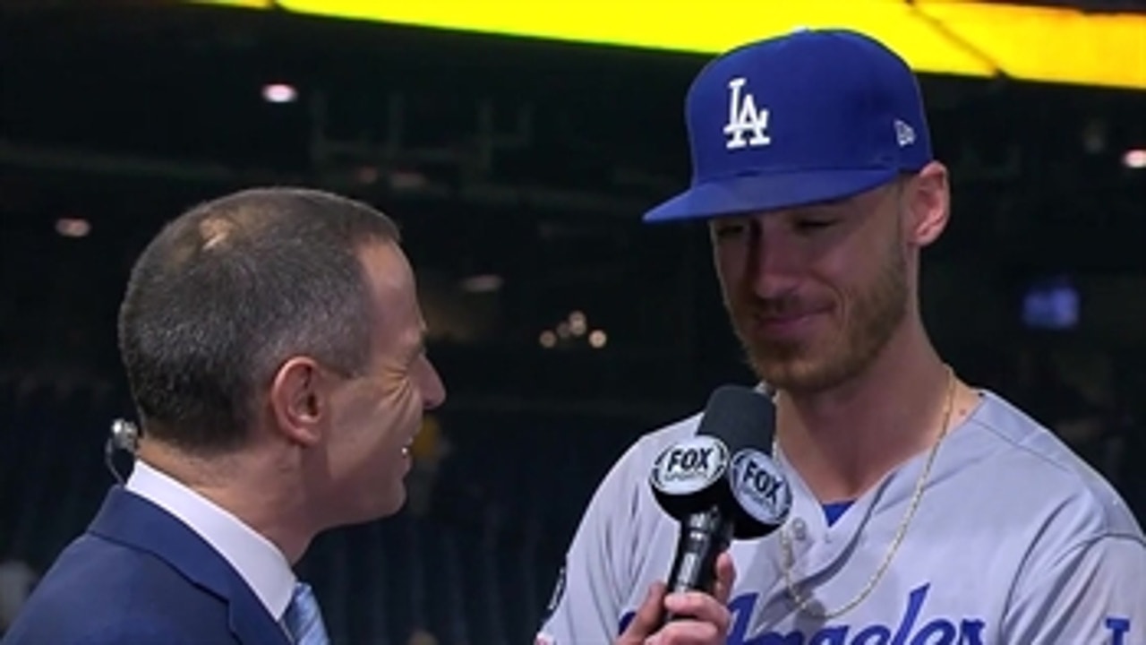 J.P. Morosi speaks with Cody Bellinger after the Dodgers 7-2 win