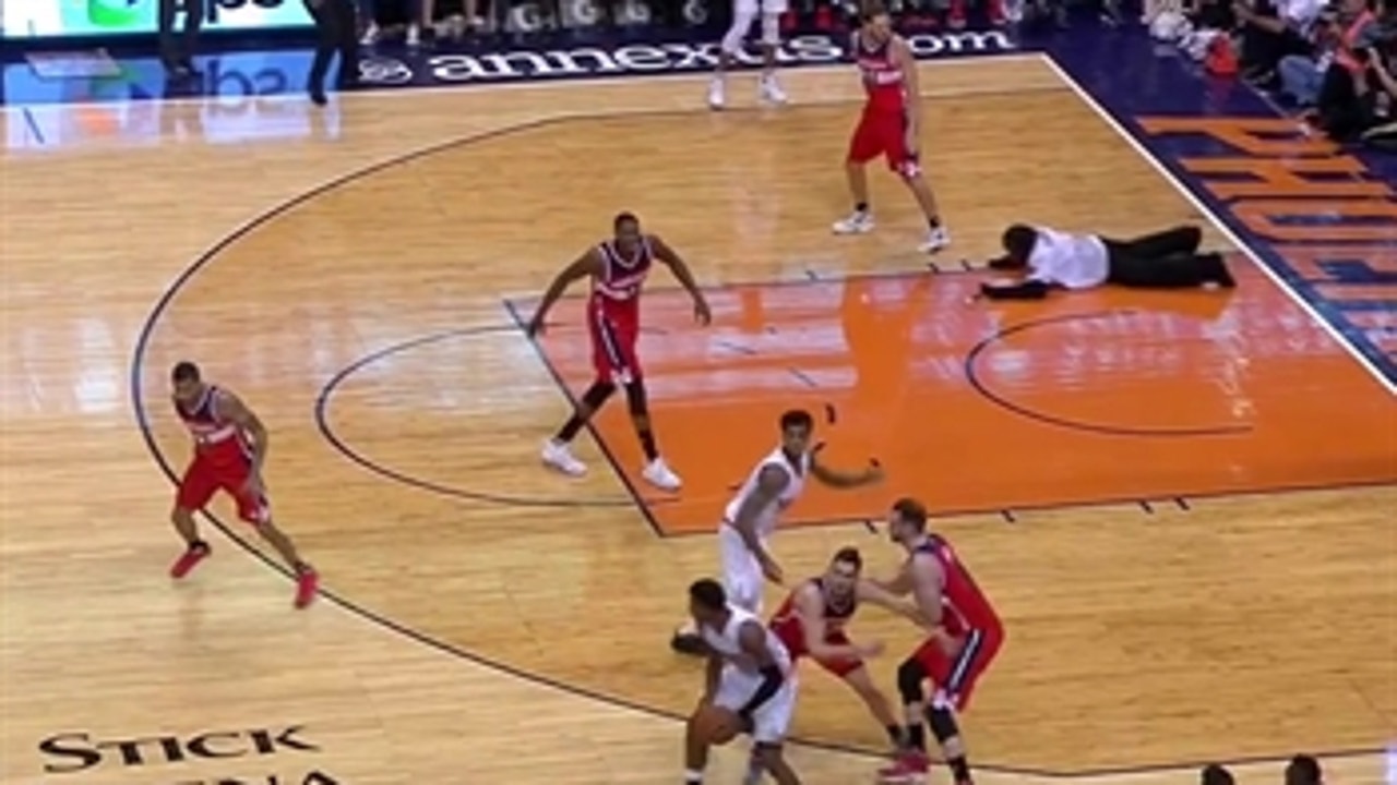 Suns Gorilla dives on court during play to protect players