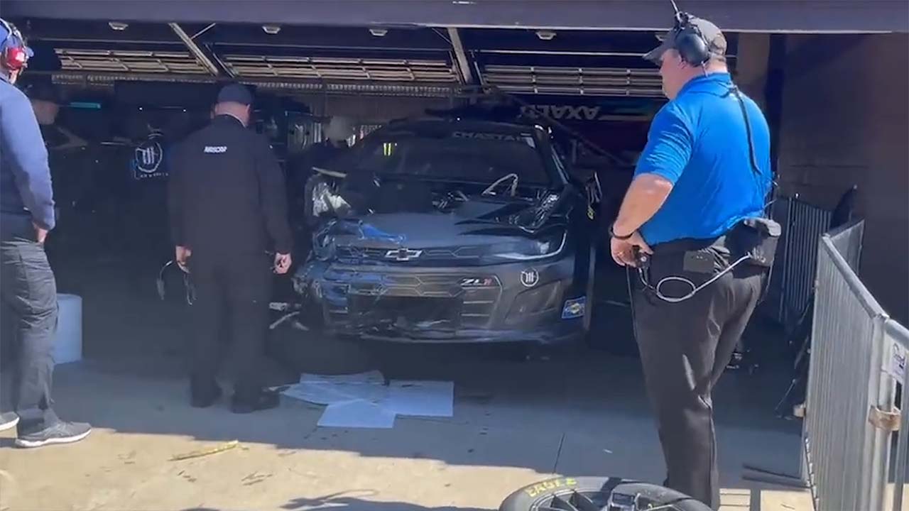 NASCAR inspects Ross Chastain's crashed car after the Cup Series practice in Fontana