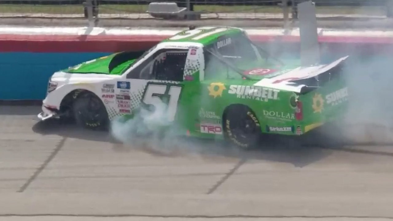 Drew Dollar slams the wall after slight contact with Deegan