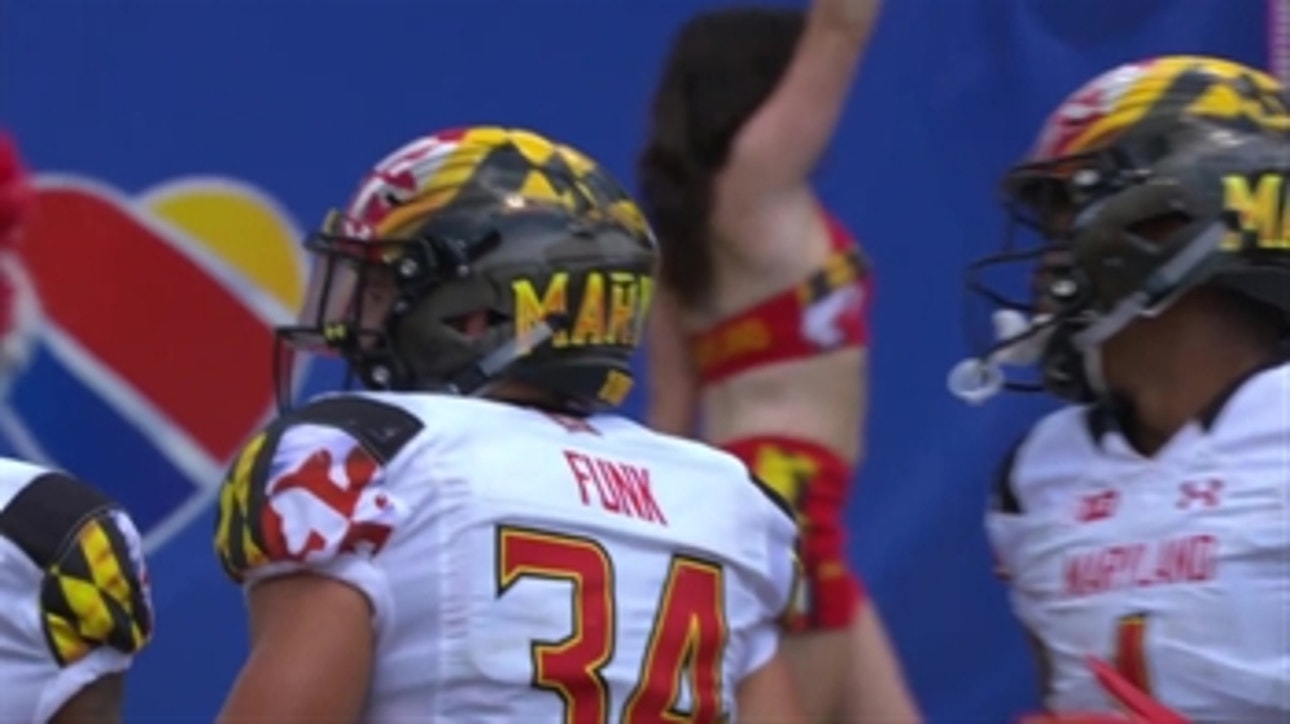 Maryland's Jake Funk runs it in to extend the Terps' lead to 51-34 over No. 23 Texas