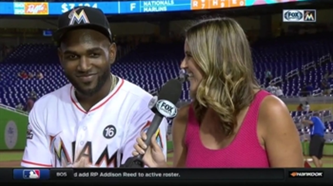 Marcell Ozuna reacts to the comeback win against the Nationals