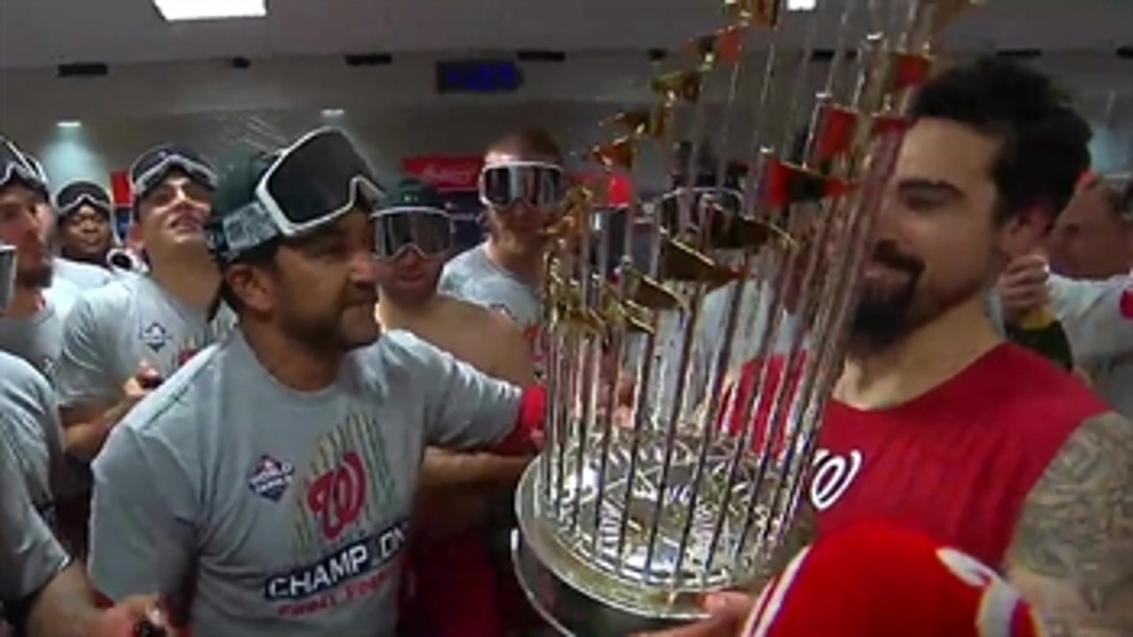 Watch the Washington Nationals pop champagne in the clubhouse