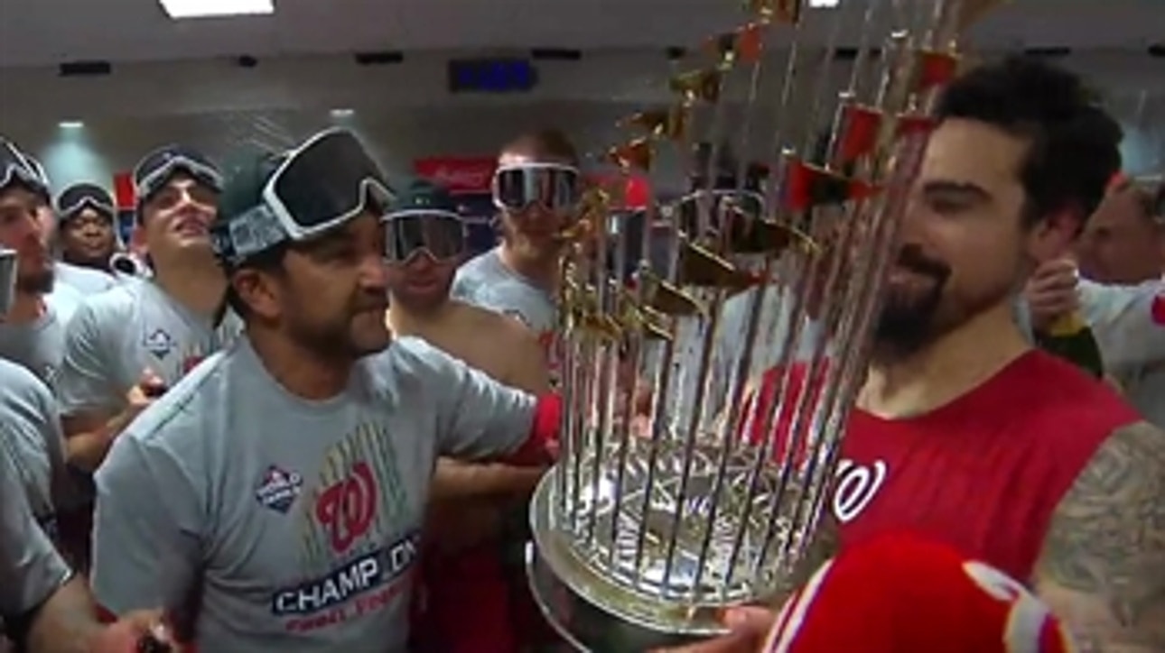 Watch the Washington Nationals pop champagne in the clubhouse