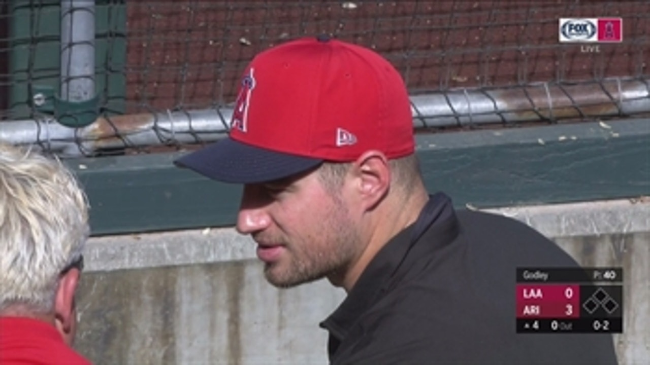 Eagles TE Brent Celek hanging out in Angels dugout while visiting Mike Trout