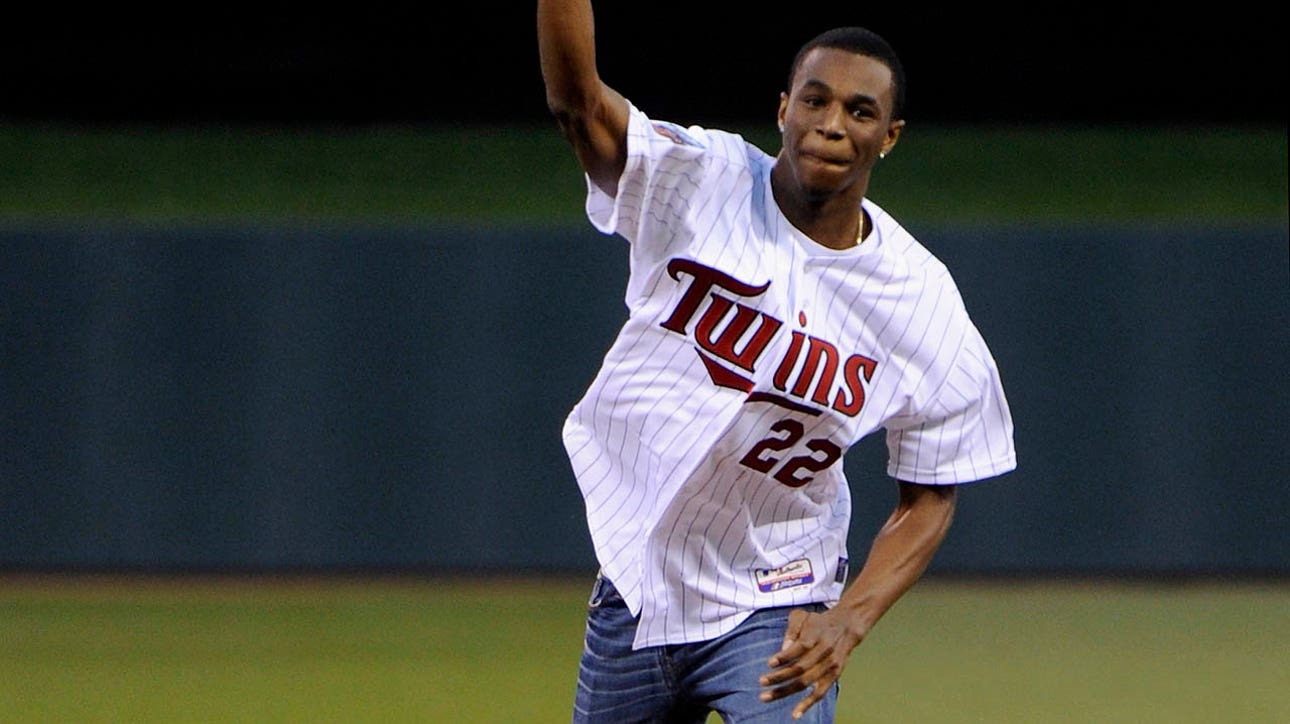 Wolves' Andrew Wiggins throws first pitch