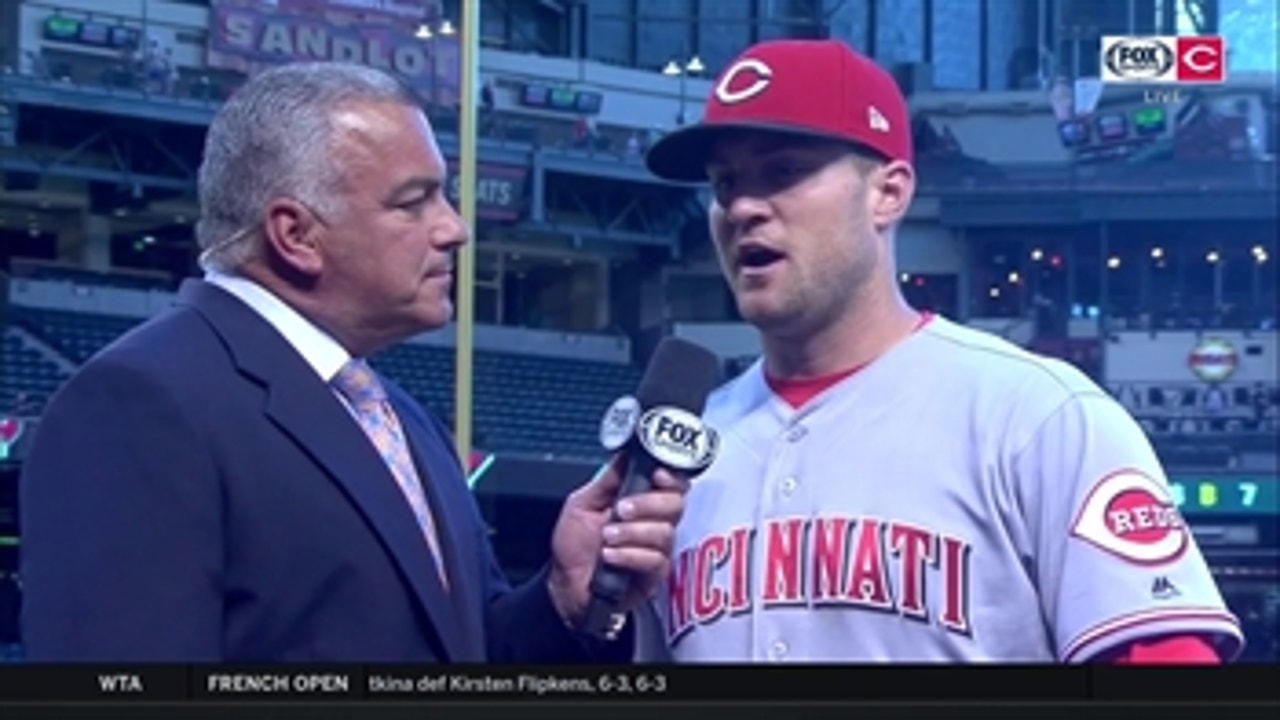 Scott Schebler being pushed by Duvall, Hamilton in outfield