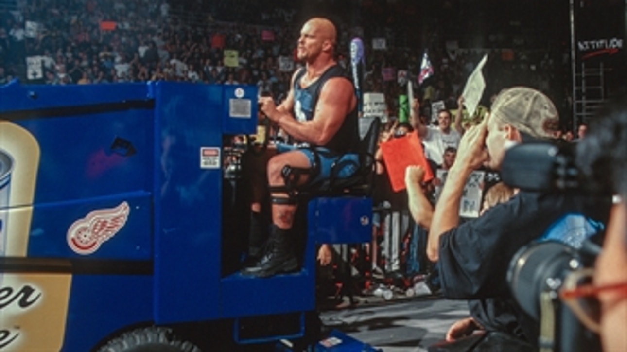 "Stone Cold" Steve Austin drives a zamboni to the ring