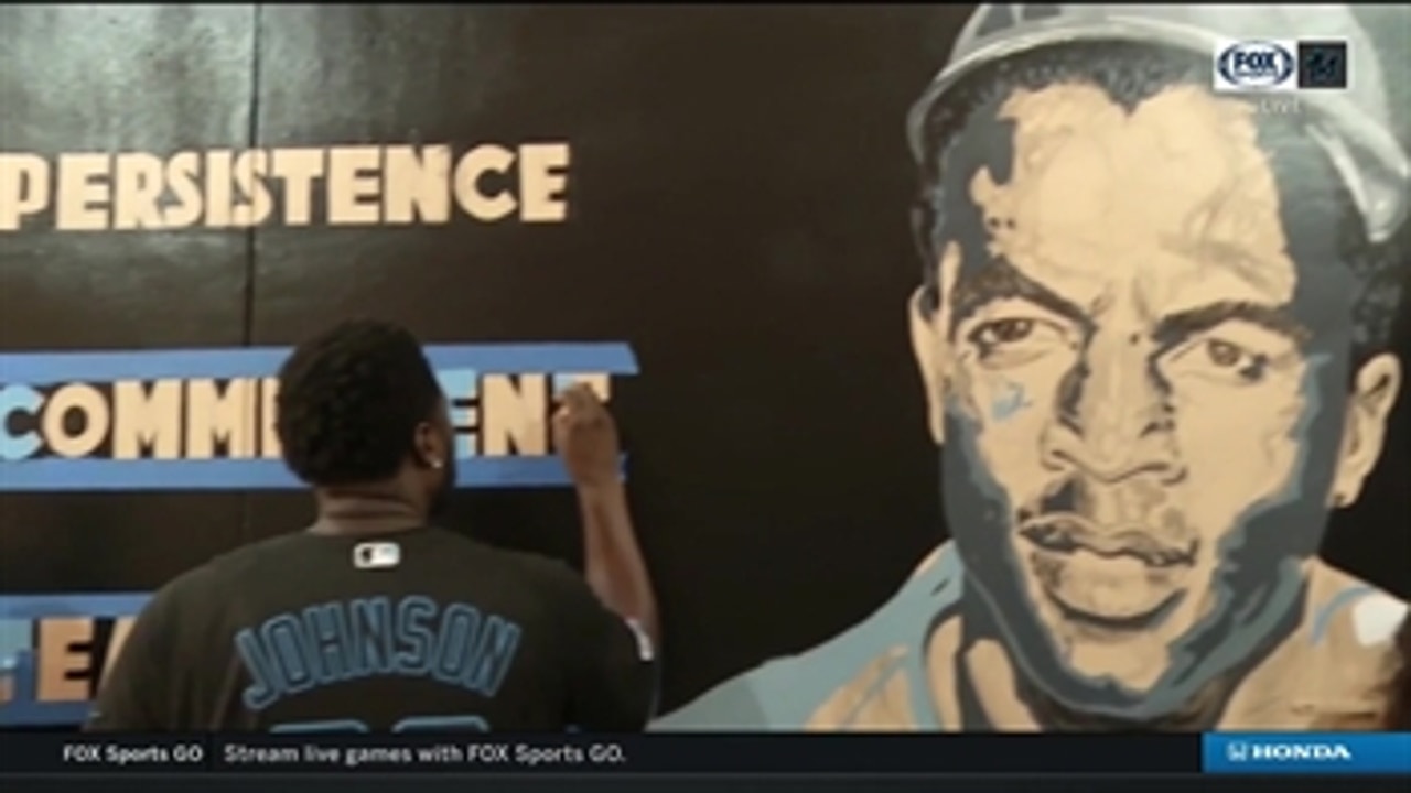 Marlins continue Impact Week with Beautification Project that included the painting of Jackie Robinson-themed mural