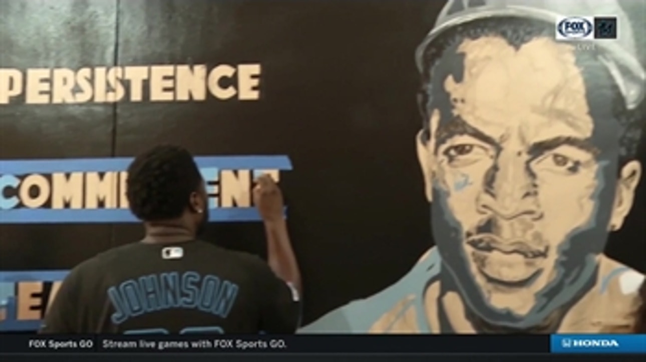 Marlins continue Impact Week with Beautification Project that included the painting of Jackie Robinson-themed mural