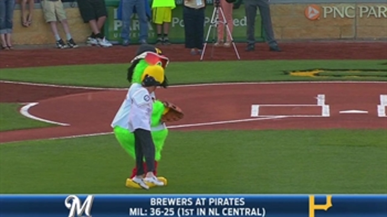 Armless man throws first pitch with foot