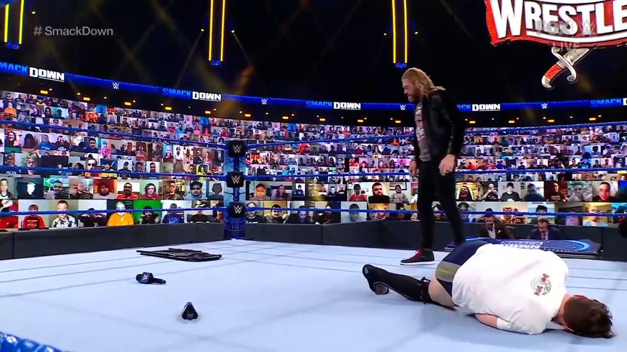 Edge confronts Daniel Bryan in his quest for the Championship