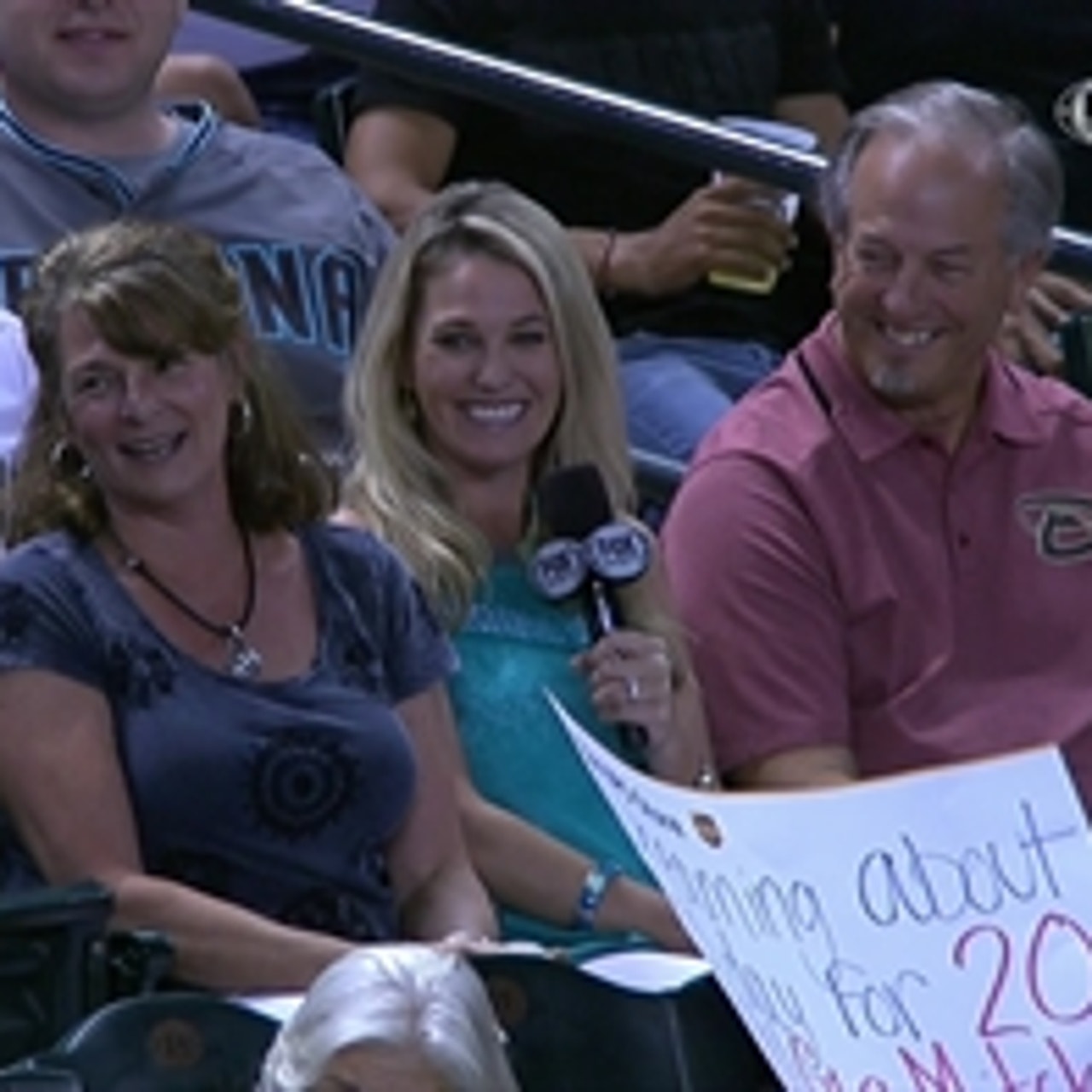 Haniger's parents receive ball from first putout