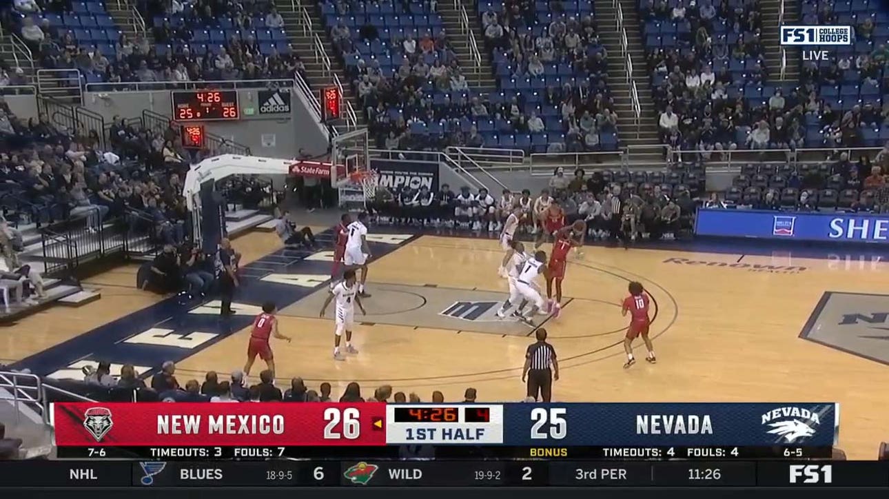 New Mexico's Jaelen House drains a step-back three-pointer as the shot clock expires