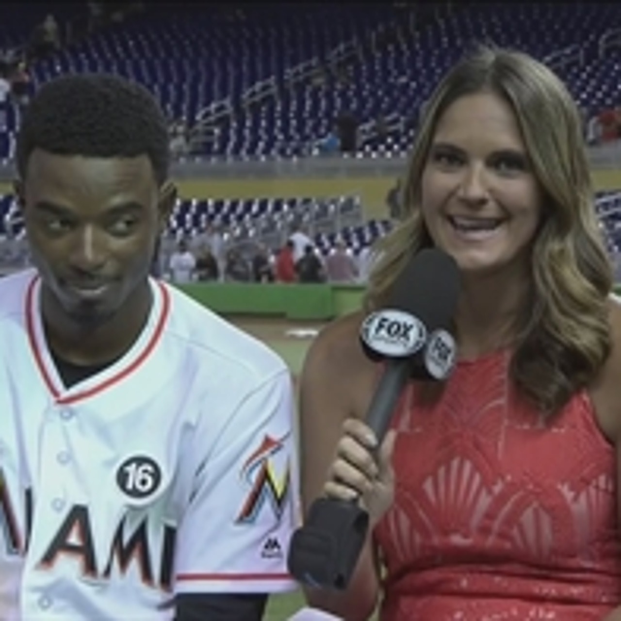 Dee Gordon gets a postgame pie in the face by the clubhouse monkey
