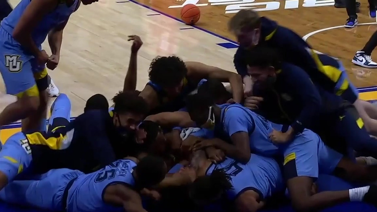 Justin Lewis' tip-in at the buzzer wins it as Marquette upsets No. 4 Wisconsin, 67-65