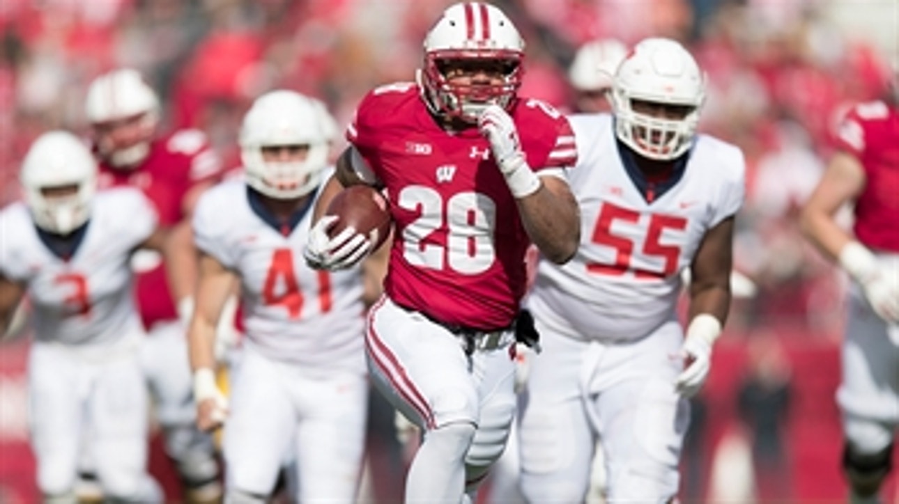 No. 23 Wisconsin rushes for 357 yards in 49-20 drubbing of Illinois