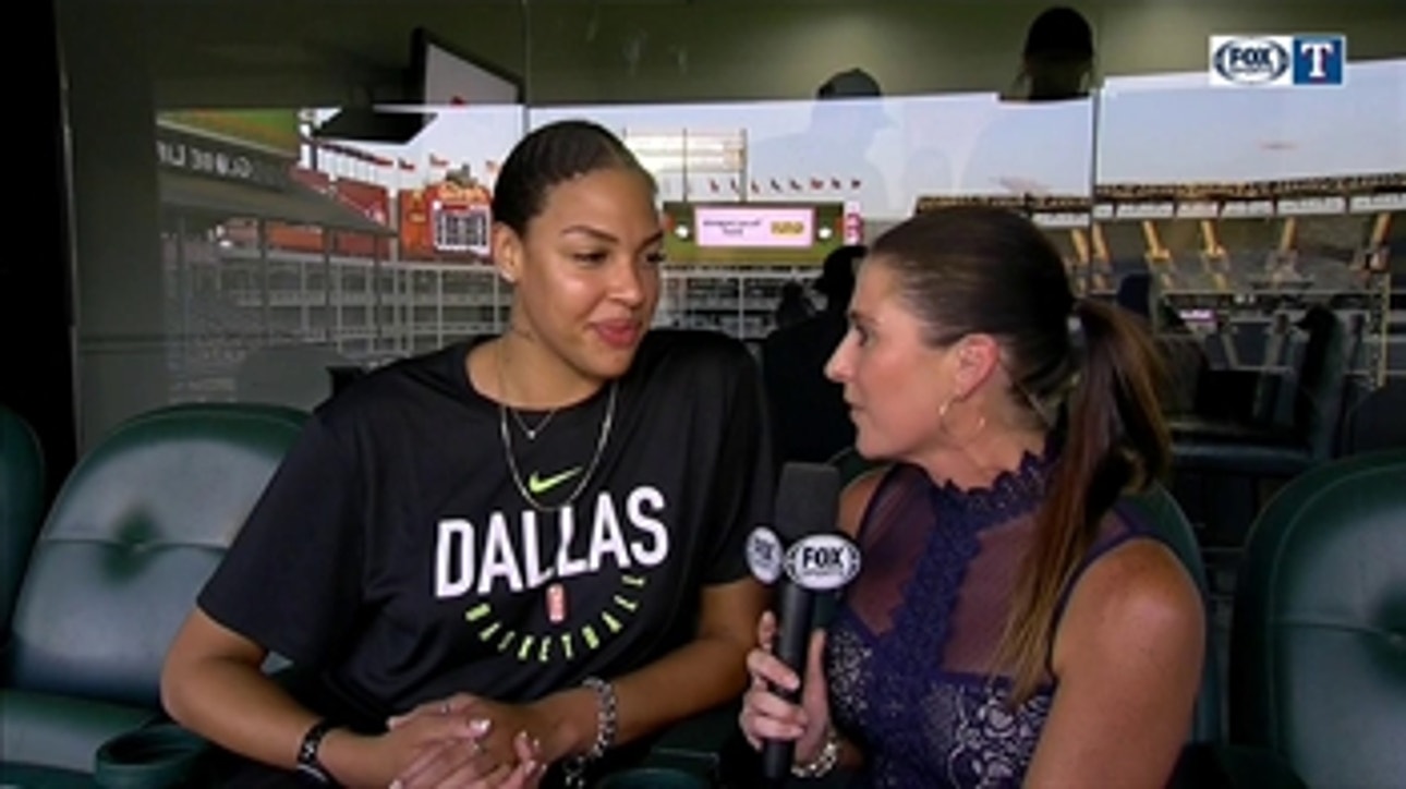 Dallas Wings' Liz Cambage throws out the first pitch