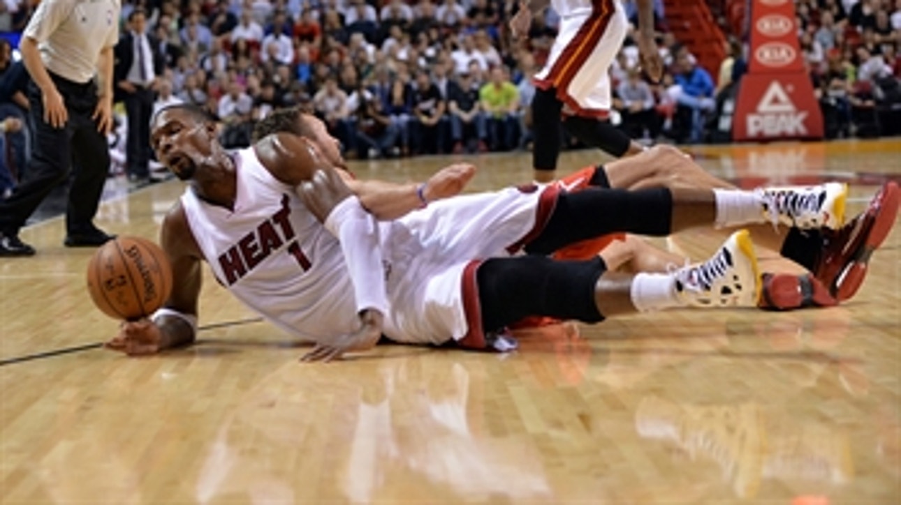 Heat drop first game of season to Rockets