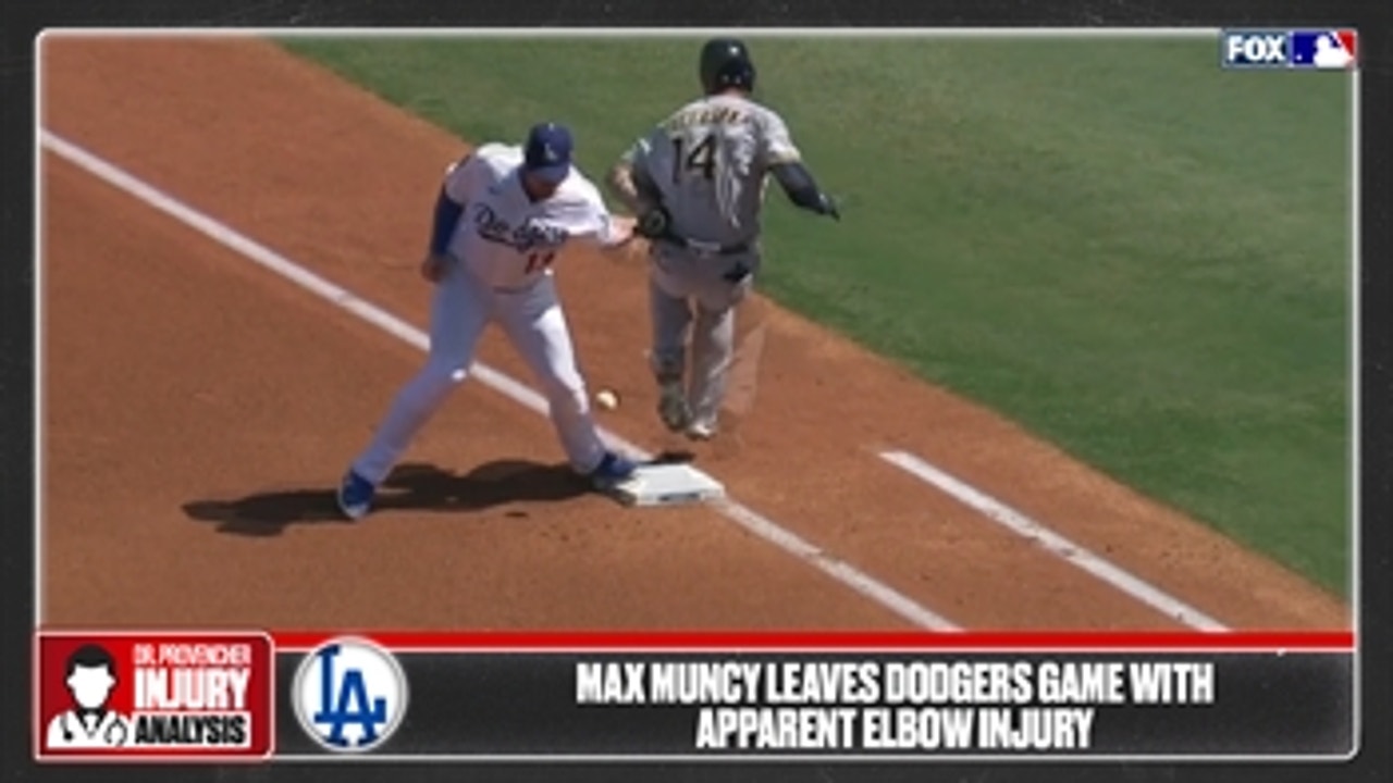 Dodgers' Muncy injured in play at 1B against Brewers