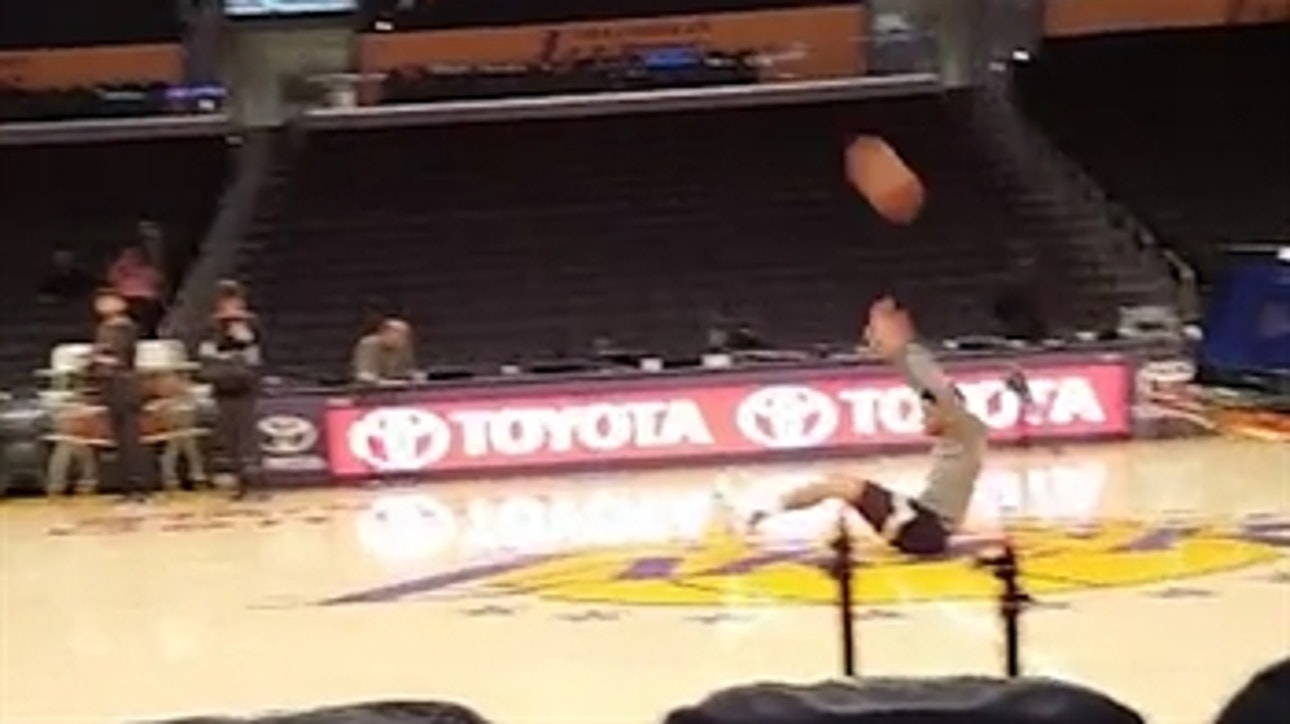 Lakers rookie D'Angelo Russell hits half-court shot while sitting down