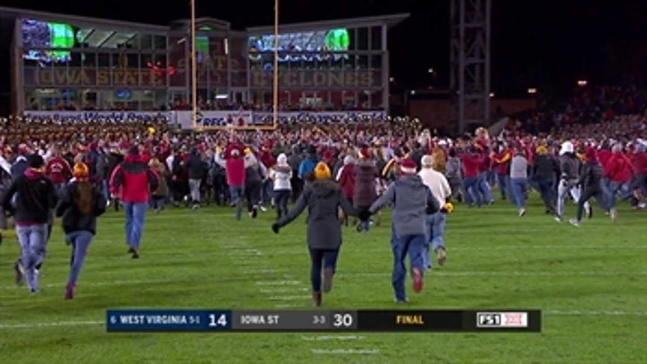 Iowa State fans rush the field after knocking off No. 6 West Virginia (but where are the T-Rexes?)