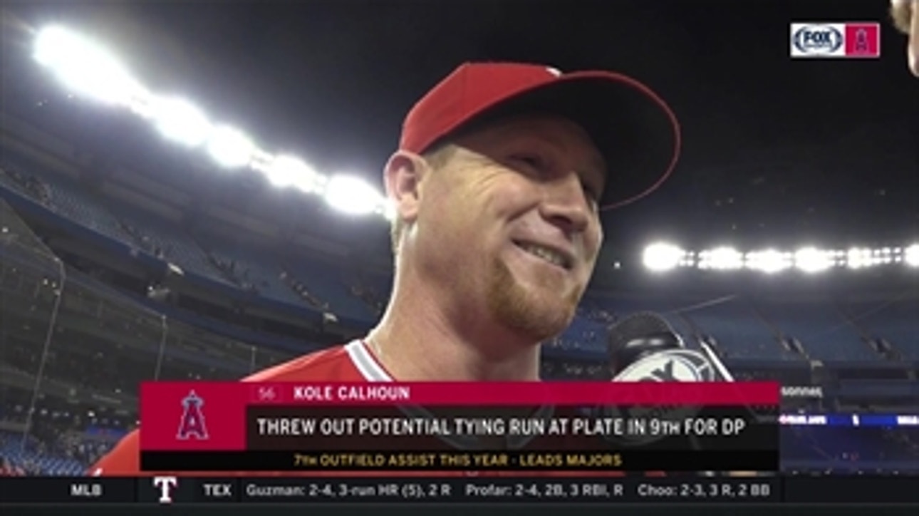 Kole Calhoun called on higher powers to help him with 9th inning putout at home