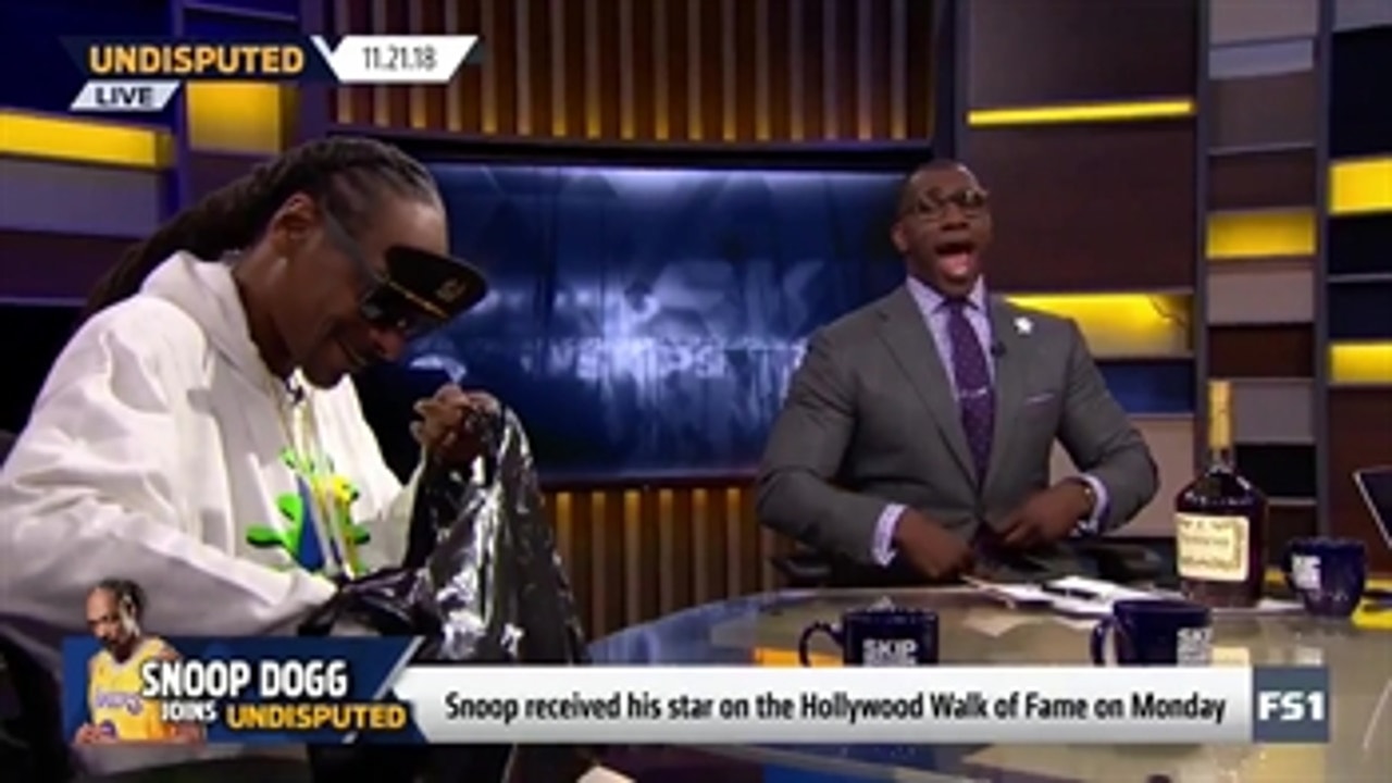 Snoop Dogg came bearing gifts (of Hennessy) for Shannon Sharpe on