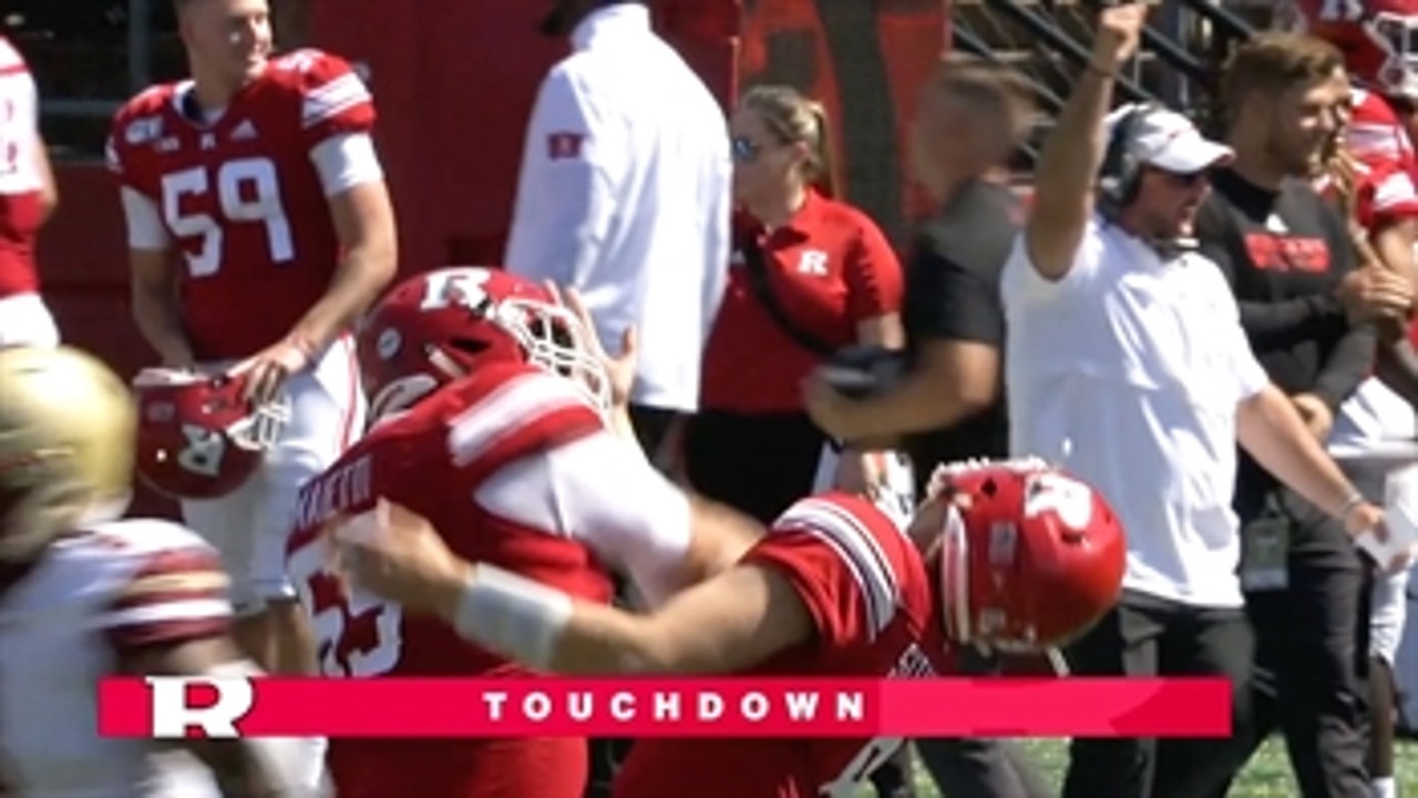 Rutgers center punches Rutgers QB in the face after TD