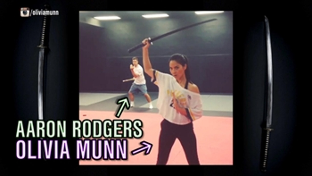 Olivia Munn and Aaron Rodgers show off their sword-fighting skills