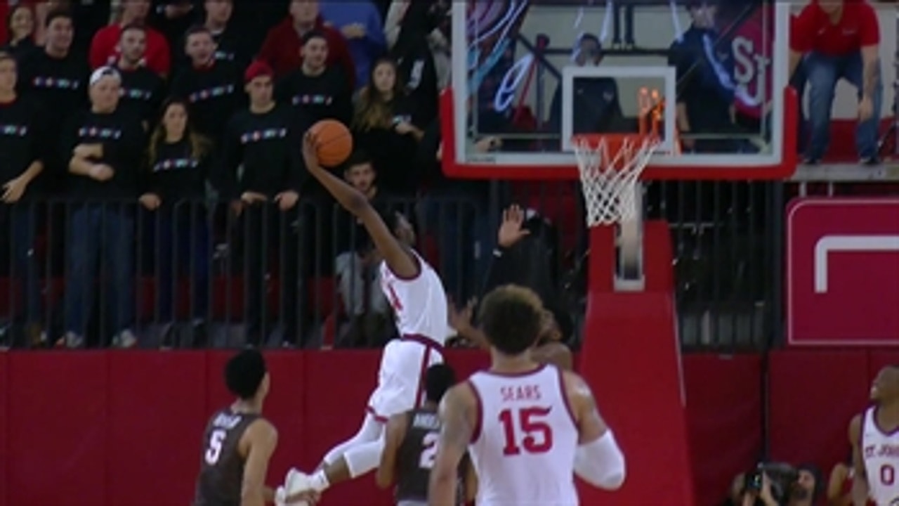'Dunk of the Year' nominee ' St John's guard Greg Williams skies for the slam