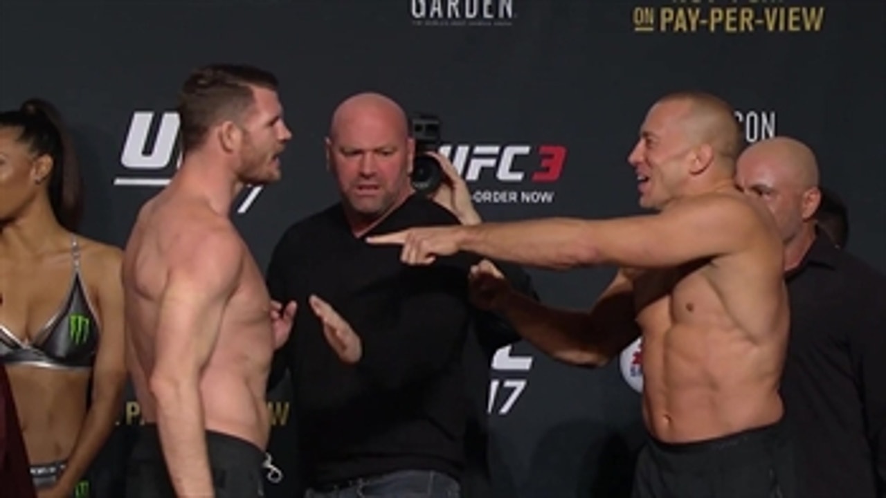 Michael Bisping and George St-Pierre face off at UFC 217 weigh-ins as the trash  talk continues