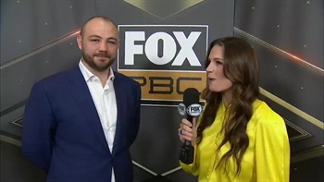Adam Kownacki talks with Heidi Androl before his press conference from Brooklyn, NY