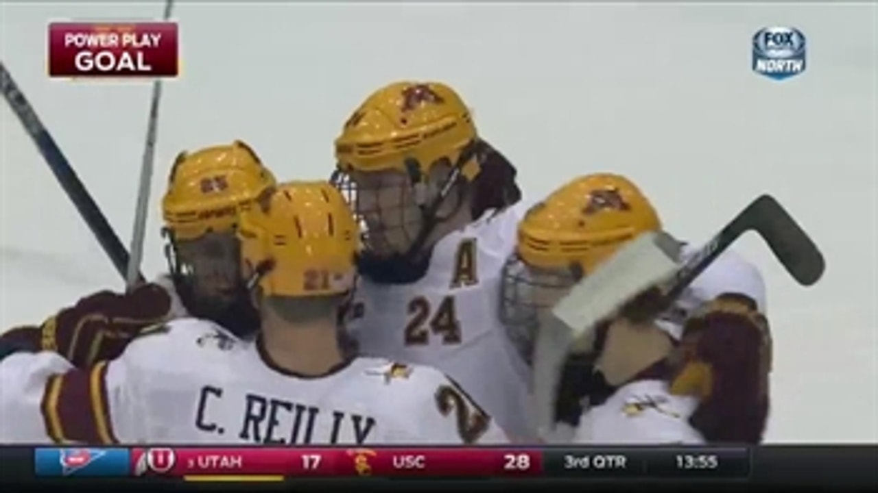 Hudson Fasching scores his second goal in the Gophers' win
